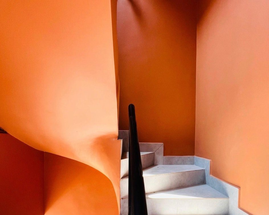 Terracotta staircase · Kona Apartments